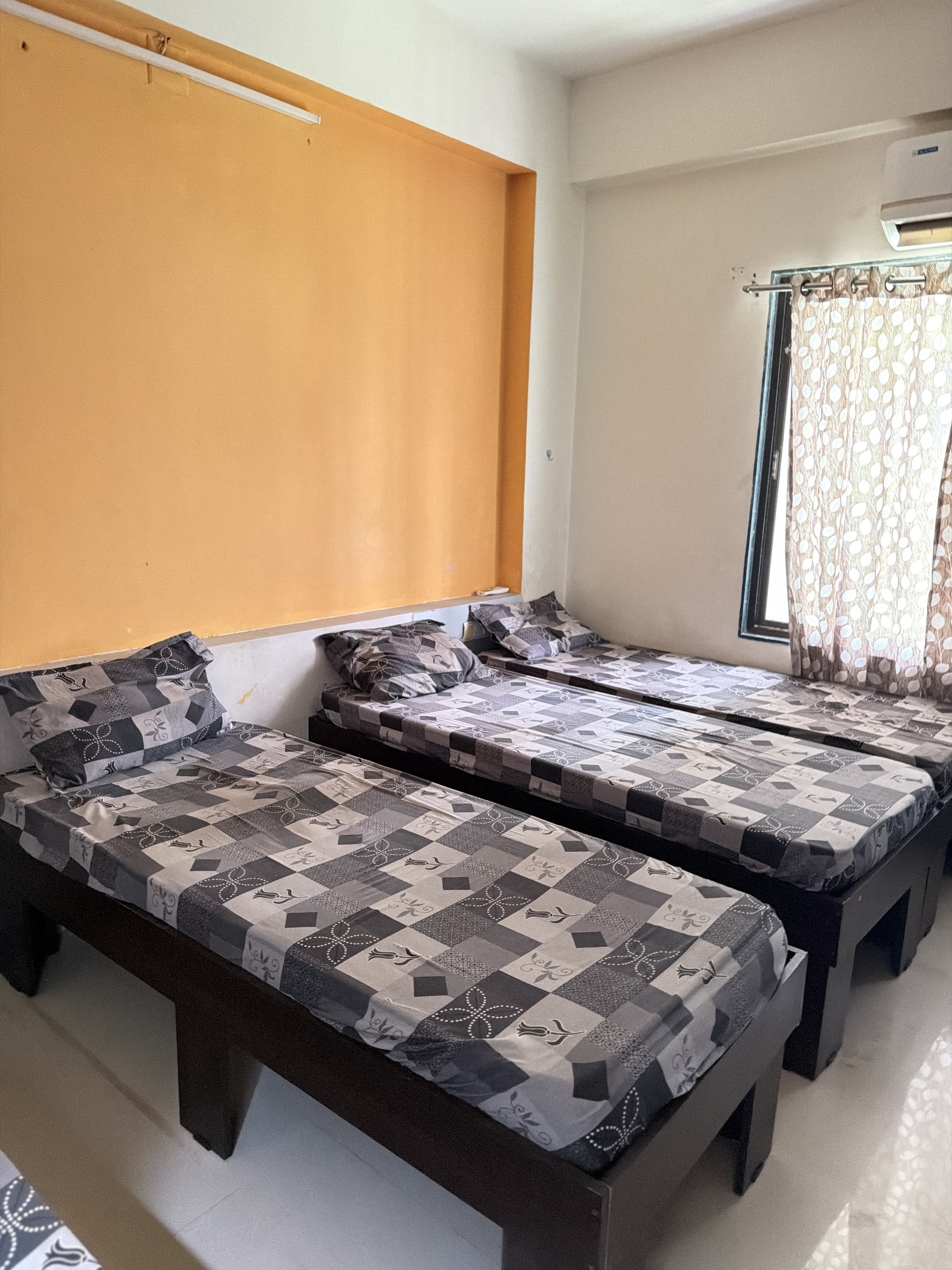 Bright AC room with two beds, Ansh Boys PG