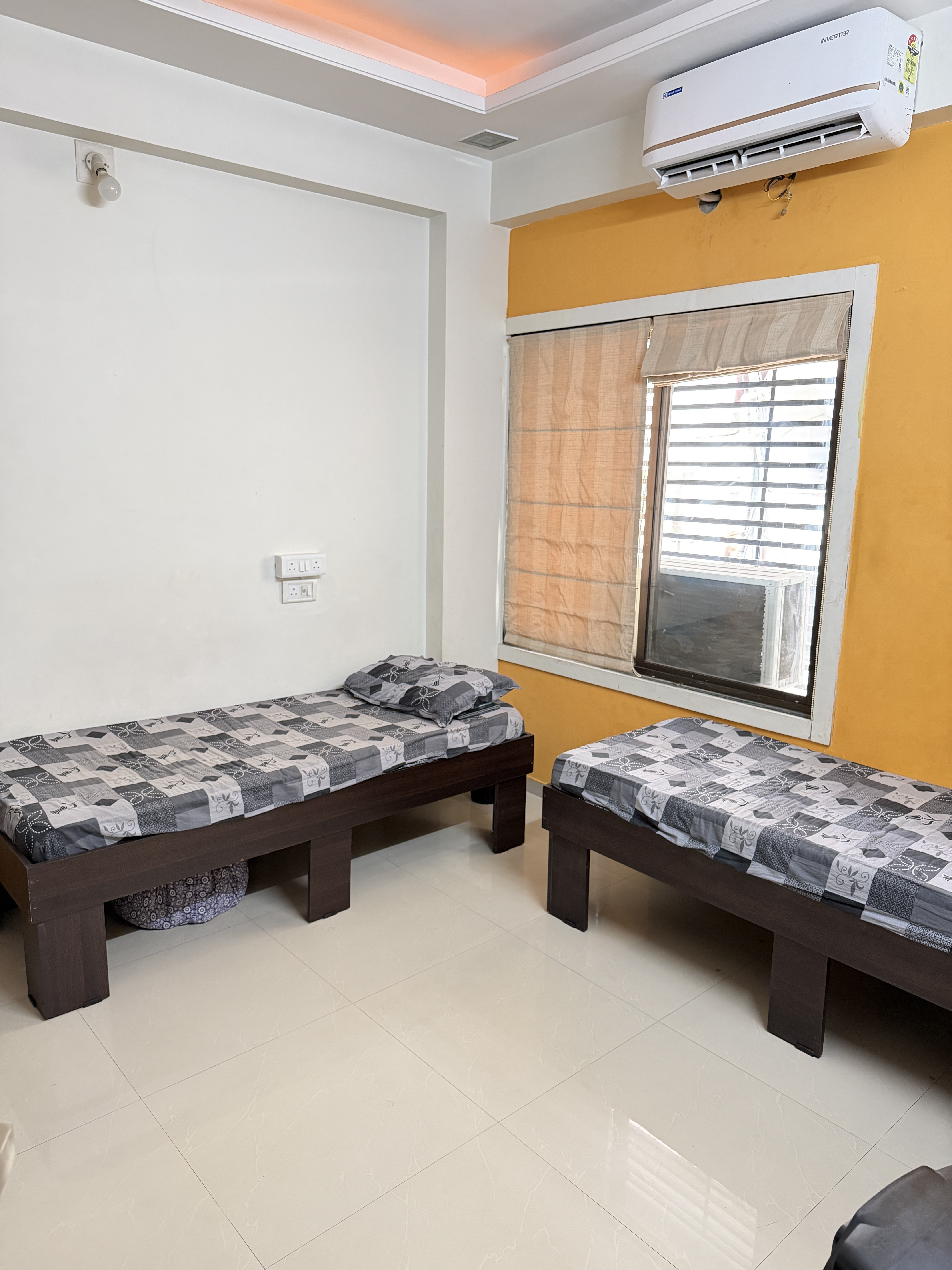 AC room with study-friendly layout, Ansh Boys PG