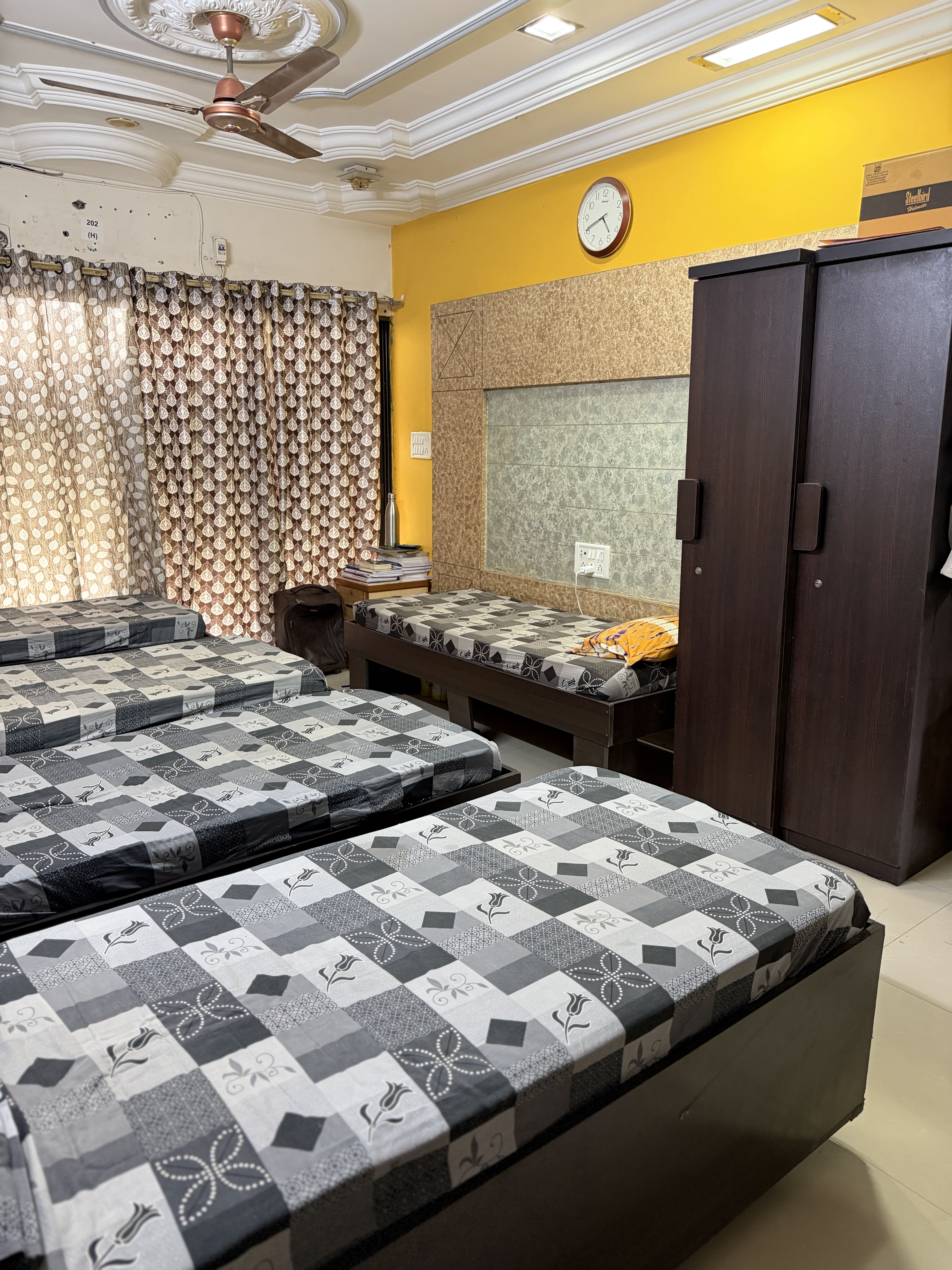 Spacious shared room at Rentastic Homes Ansh Boys PG